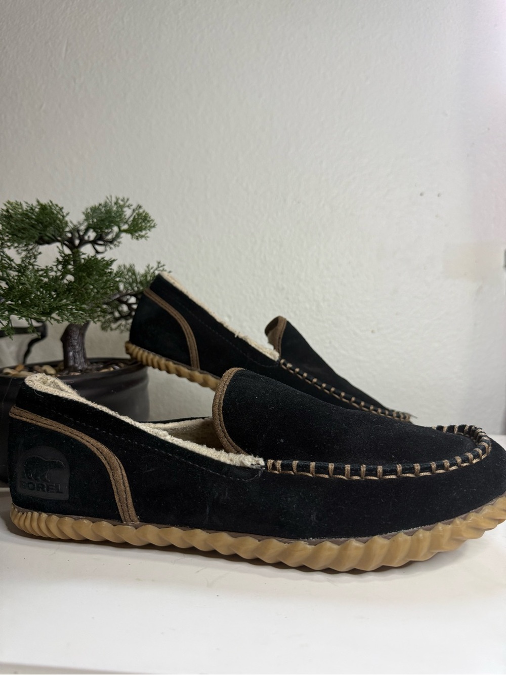 Sorel Dude men size 9.5 Black Suede Slip-On Moccasins with Tan Trim